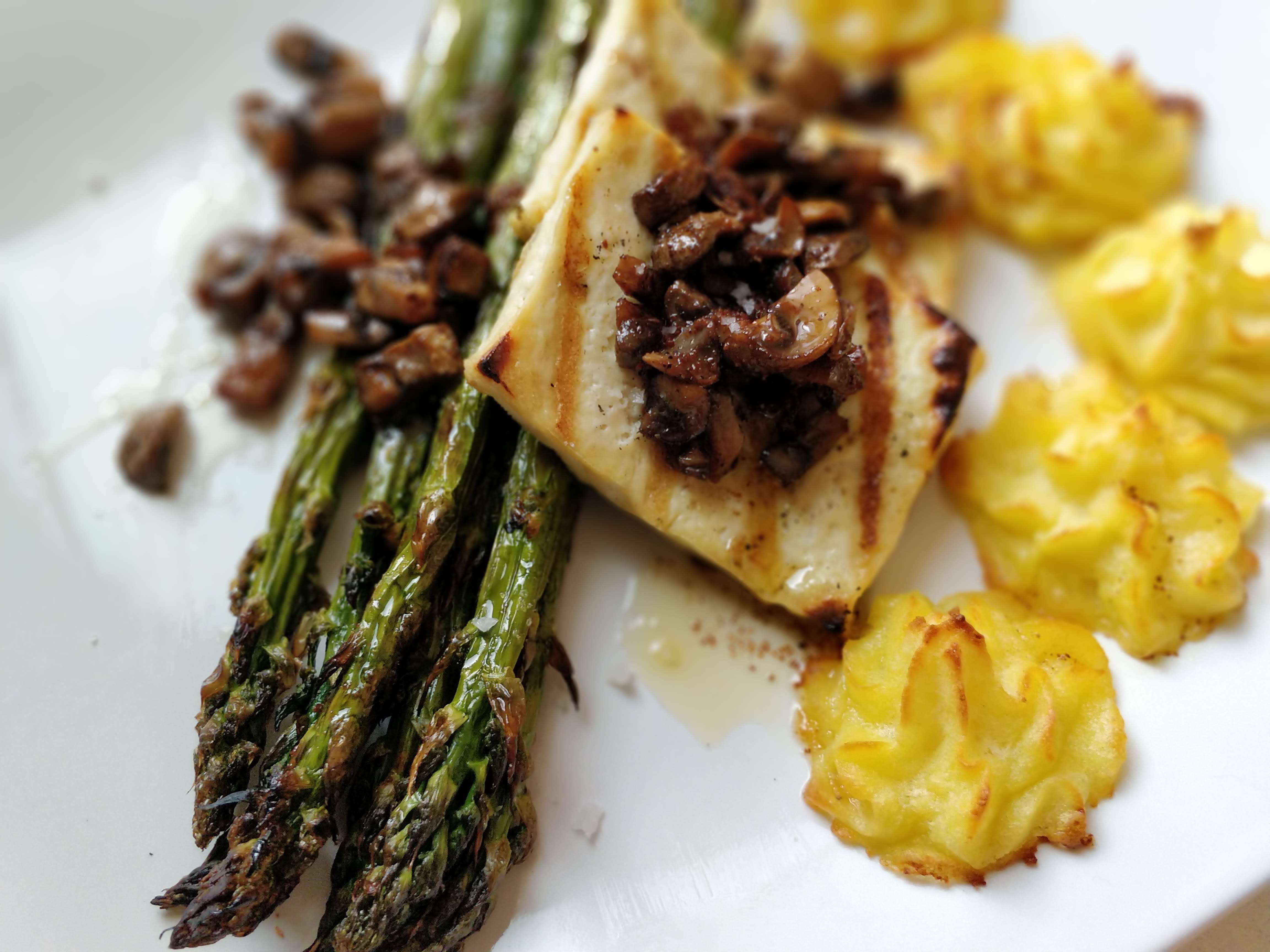 Duchess potatoes, asparagus, tofu, mushrooms